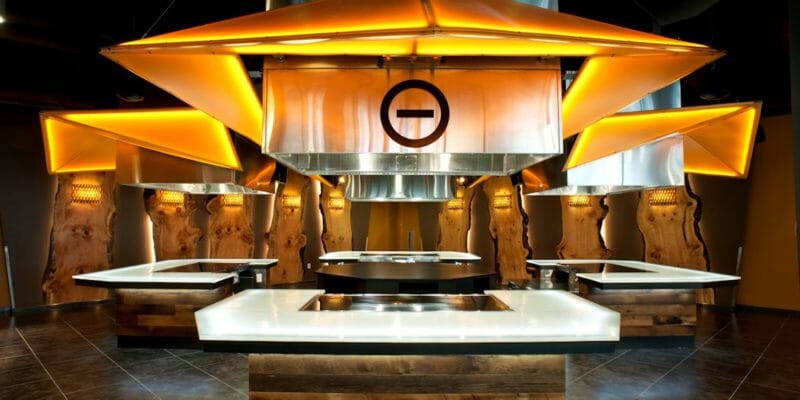 Bark House Live Edge wood slabs create wall in Turner Place dining facility