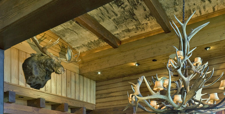 Eco friendly white birch wall panels on ceiling in dining room in Linville, NC