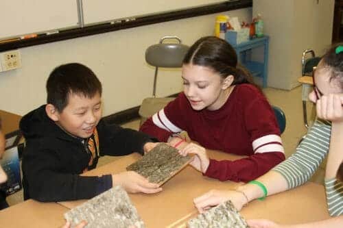 5th Grade students in Quincy, MA learn about eco-friendly building products by using Bark House Shingles.